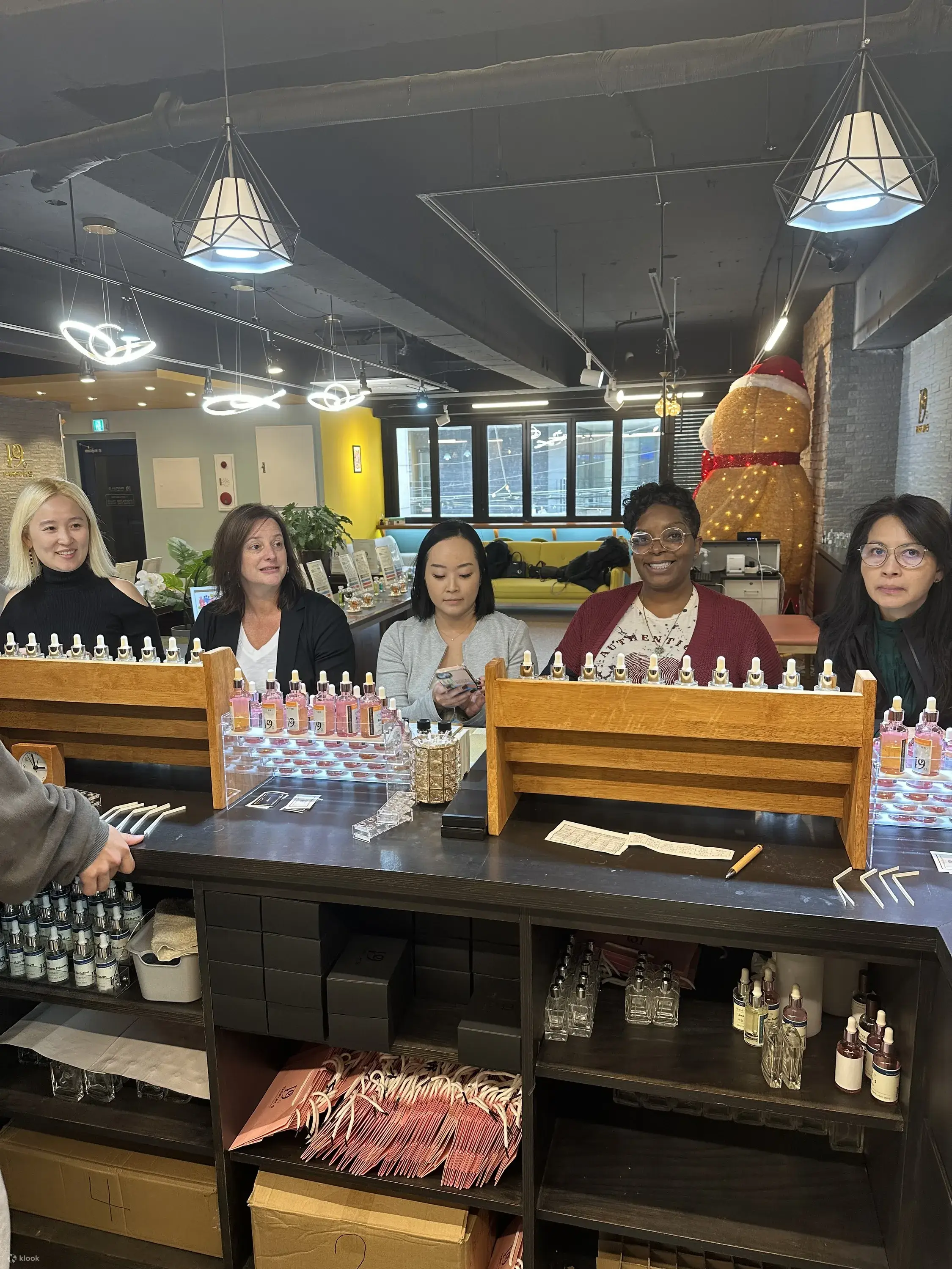 Group taking a perfume class at Parfum9