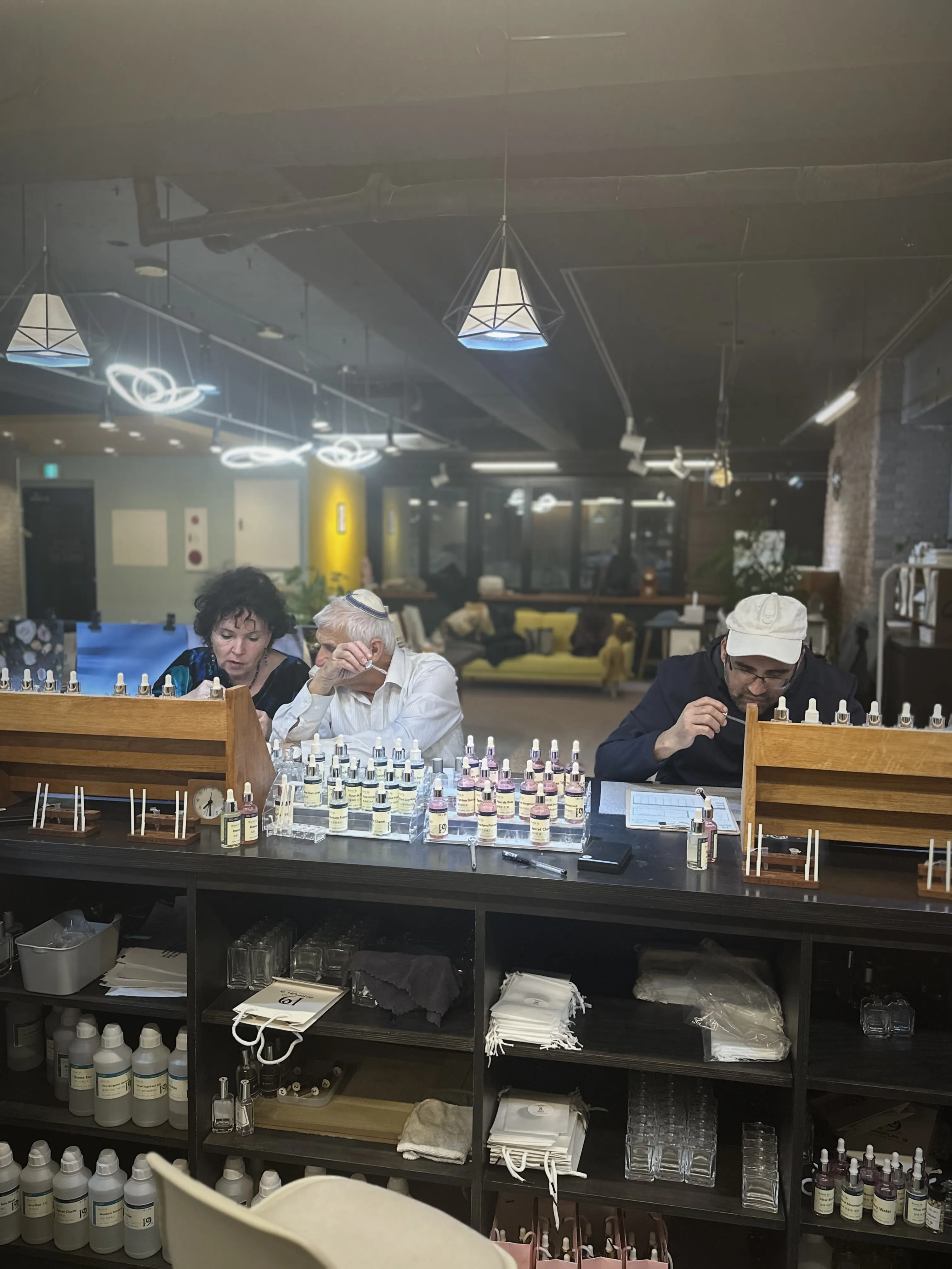 Travelers blending perfume at Parfum9