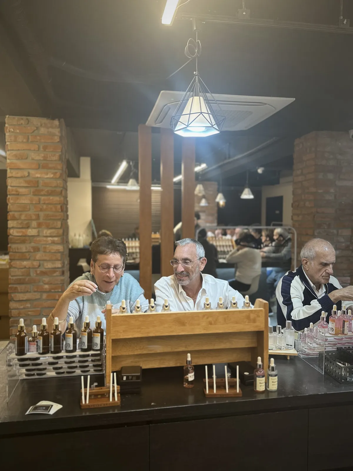 Family travelers making perfume at Parfum9